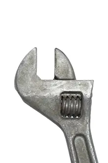 Construction Tool Stampe: Old adjustable spanner isolated on white background