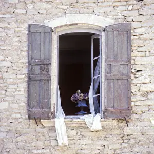 French Architecture Images Stampe: Opened window with shutters in a stone facade