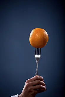 Fresh Healthy Eating Stampe: Orange on a fork