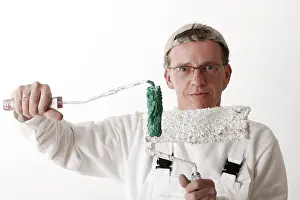 Paint Roller Artist Stampe: Painter with paint rollers