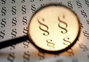 Justice Symbolic Picture Stampe: Paragraphs under loupe