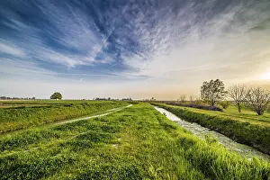 Rural Agriculture Photography Stampe: Two parallel irrigation canals run through the fields in the countryside of Romagna