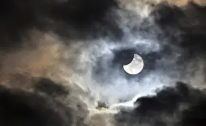 Solar Eclipse Germany Stampe: Partial solar eclipse, thin cloud cover