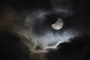 Central Europe Cloudy Skies Stampe: Partial solar eclipse, thin cloud cover