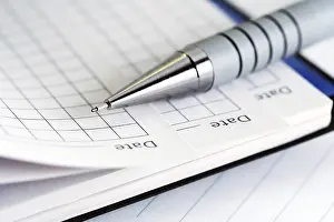 Uninhabited Office Space Stampe: Pen on the notebook