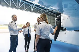 Aircraft Maintenance Stampe: Pilot instructor explaining airplane propeller