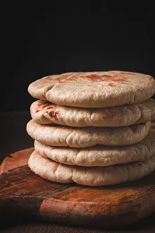 Grocery Store Food Still Life Stampe: Pita bread, stack, on the table, no people
