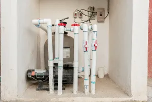 Pool Water Purification Stampe: Pool pump with sand filter installed
