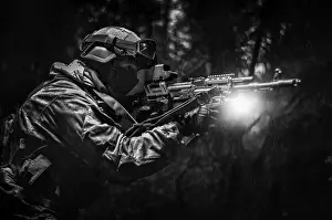 Special Forces Soldier Stampe: Portrait of a commando in the forest