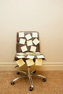 Teamwork And Success Concept Stampe: Post it notes on a chair