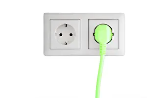 Ecological Conservation Image Stampe: Power socket with a green plug