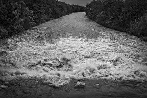 Lower Austria Nature Scene Stampe: A powerful river with a strong current under a cloudy sky