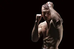 Professional Boxer Stampe: Professional boxer posing in the studio