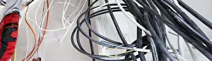 Professional Electrical Installation Stampe: Professional electrical installation on a building shell