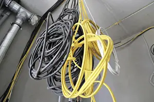 Professional Electrical Installation Stampe: Professional electrical installation on a building shell