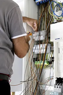 Electrical Installation Stampe: Professional electrical installation on a building shell