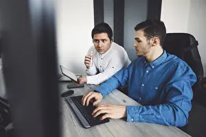 Computer Specialist Stampe: IT Programmer Working on Desktop Computer