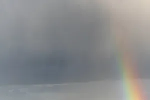 Springtime Alsace France Stampe: Rainbow appears in rain clouds in spring