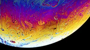 Deserted Interior Space Photo Stampe: Rainbow soap bubble on a dark background