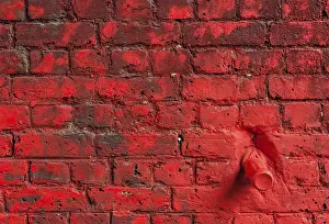 Red Brick Wall Background Image Stampe: Red bricks pattern background of a wall