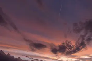 Central Europe Cloudy Skies Stampe: Reddish clouds in the evening sky
