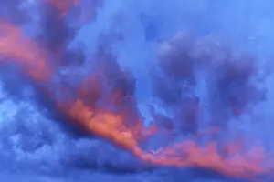 Dramatic Cloud Formations Europe Stampe: Reddish clouds in the evening sky