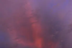 Central Europe Cloudy Skies Stampe: Reddish clouds in the evening sky
