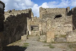 Pompeii Ruins Stampe: Remnants of old terracotta brick and stone wall structures with rectangular