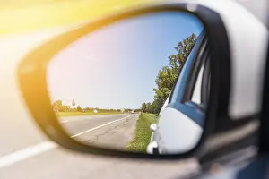 Deserted Highway Stampe: Road reflected side mirror