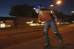 Leisure Time Hobby Stampe: Rollerblader with lighting at dusk