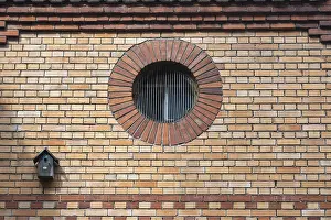Brick Wall Architecture Stampe: A round window, also called oculus