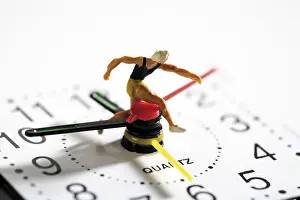 Clock Face Close Up Stampe: Runner on a clock: time is running out