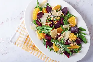 Fresh Arugula Salad Stampe: A salad made with chunks of beet