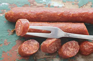Meat Products Images Stampe: Salami with a fork