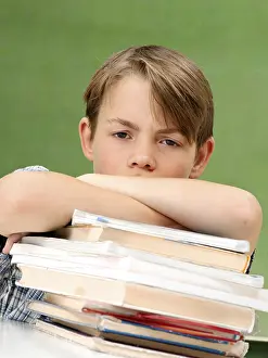 Schoolboy With Books Stampe: Schoolboy with a stack of books