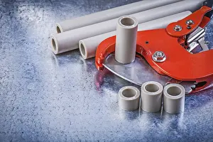 Metal Background Studio Shot Stampe: Set of pipe coupling tools on metallic background construction concept