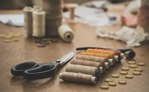 Handicraft Symbolism Stampe: Sewing concept. Scissors, threads and buttons