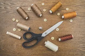 Empty Workshop Scene Stampe: Sewing concept. Scissors, threads and buttons