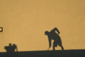 Human Being At Work Stampe: Shadow of a construction worker