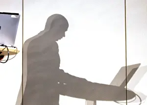 Businessman With Laptop Stampe: Shadow of manager with laptop