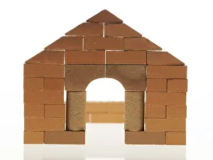 Construction Site Images Stampe: Shell of a house with a brick facade