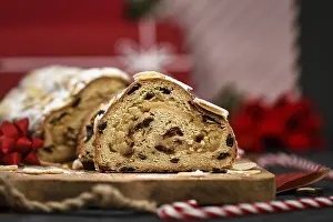 German Stollen Cake Stampe: Slice of German Stollen cake, a fruit bread with nuts