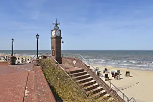 East Frisian Islands Stampe: Small clock tower and steps at the beach