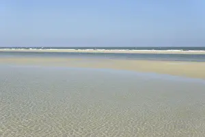 North Sea Beach Stampe: Small waves with light reflections