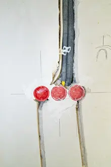 New Construction Site Stampe: Three sockets built into the wall