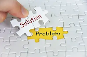Symbolic Picture Concept Stampe: Solution and Problem text on jigsaw puzzle
