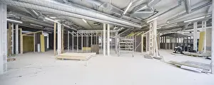 Industrial Construction Work Stampe: A spacious interior during its construction phase