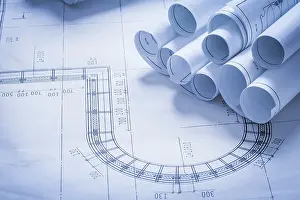 Blueprint Rolls Concept Stampe: Stack of blueprint rolls construction concept