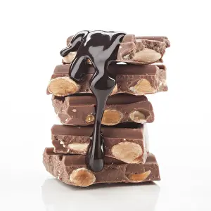 Gourmet Snacks Stampe: A stack of chocolate bars with almonds