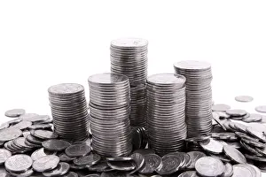 White Background Currency Stampe: Stack of coins isolated on a white background